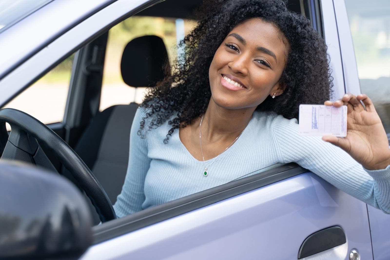 Image of girl with license
